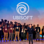 Banner image taken from the end of Ubisoft's 2017 E3 conference. CEO Yves Guillemot is standing on stage closing the conference and addressing the crowd, while some Ubisoft employees are behind him